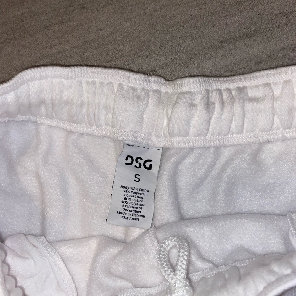 Brand new white DSG shorts. Size small never worn.